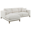Sand boucle sectional chaise sofa, rounded cushions, boxy arms, dark wood legs