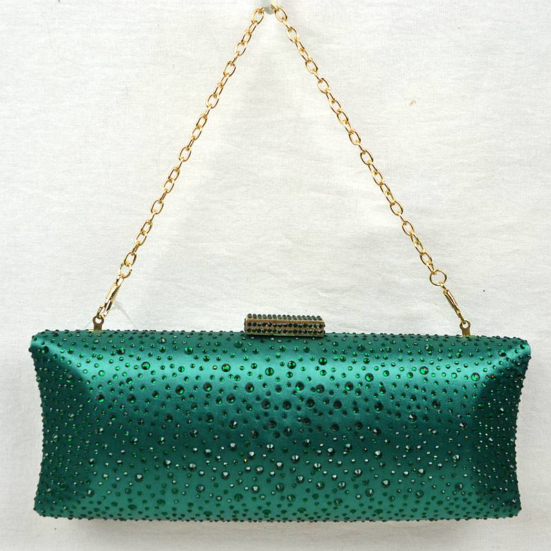 Rhinestone-studded green evening clutch bag with gold chain strap and top clasp
