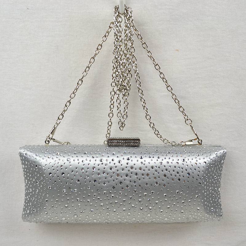 Silver studded crystal clutch bag with top chain handle and rectangular clasp