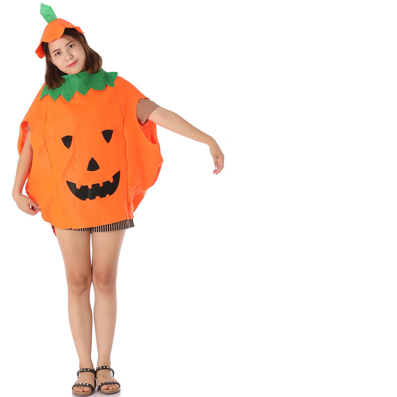Child pumpkin costume poncho with jack-o-lantern face and matching orange hat, black leggings