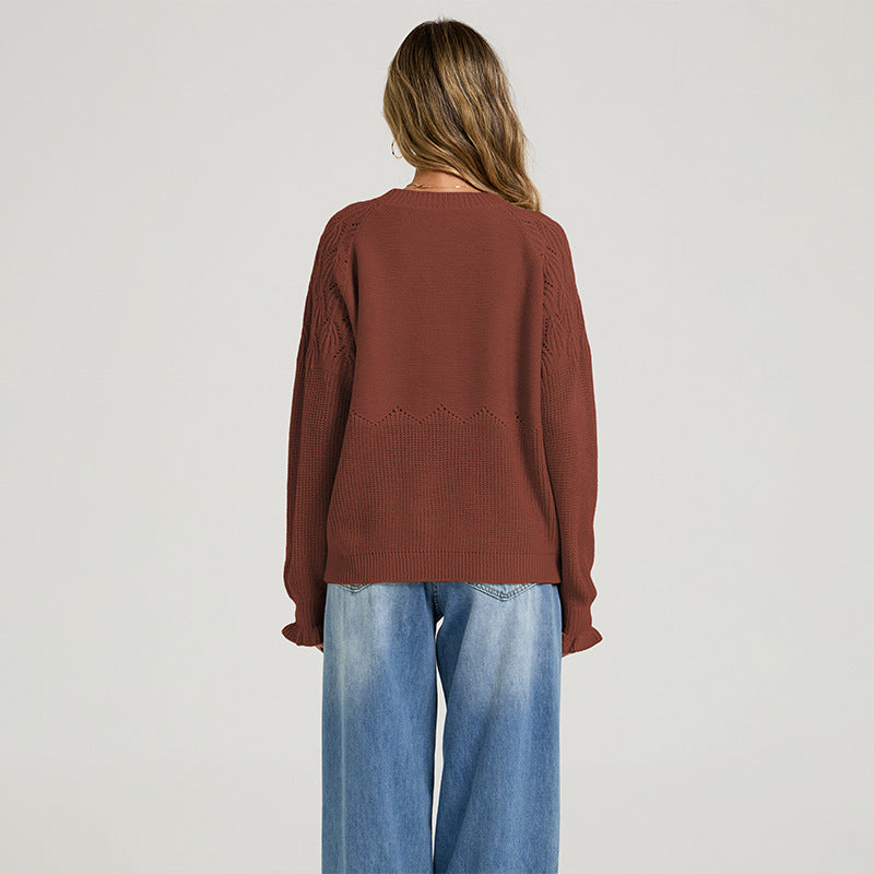 Rust red womens crew-neck sweater, rear view, with textured knit and long sleeves