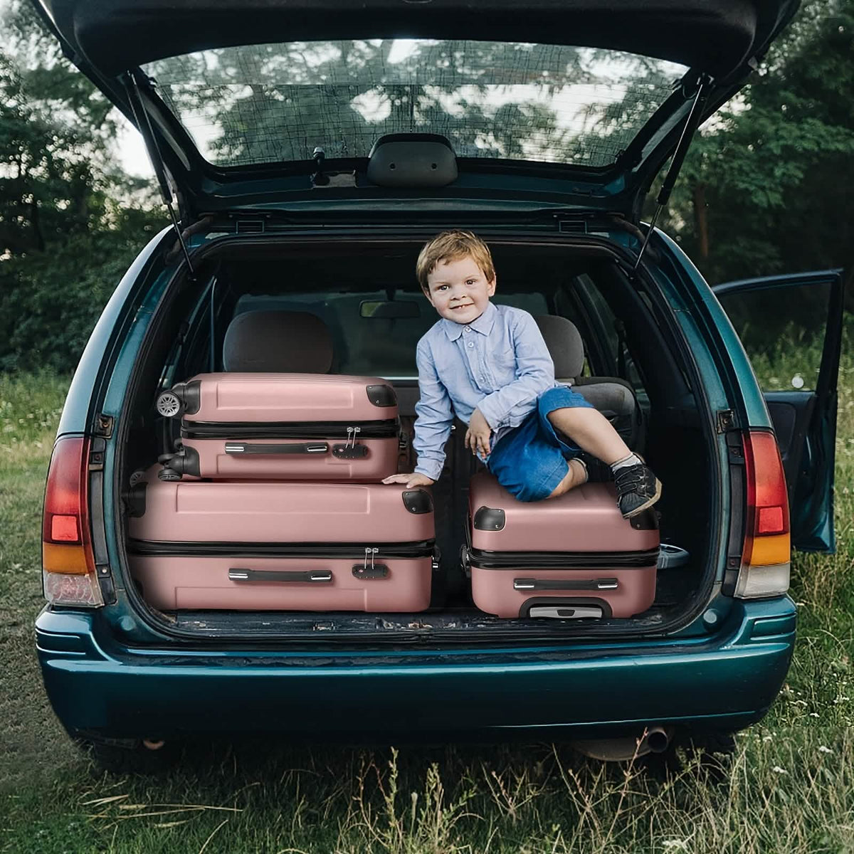 Rose hard shell luggage set stored in a car trunk with spinner suitcases