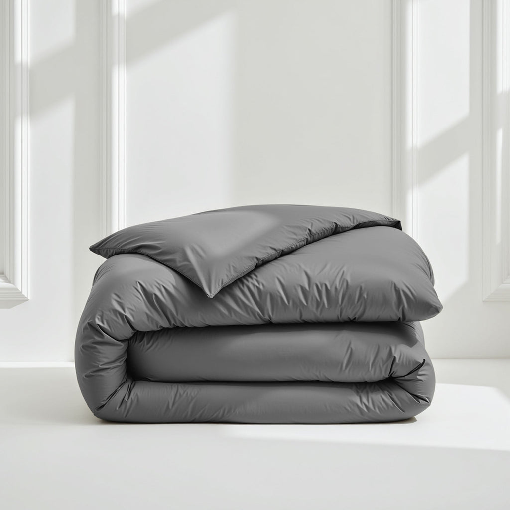 Sateen bedding set with stacked rolled comforter in medium gray color
