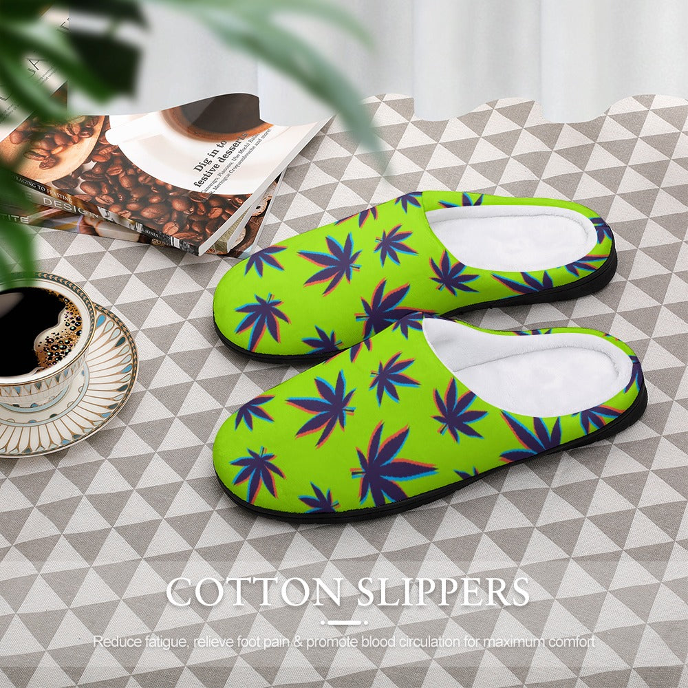 Pair of neon green cotton slippers with colorful starburst leaf pattern, slip-on