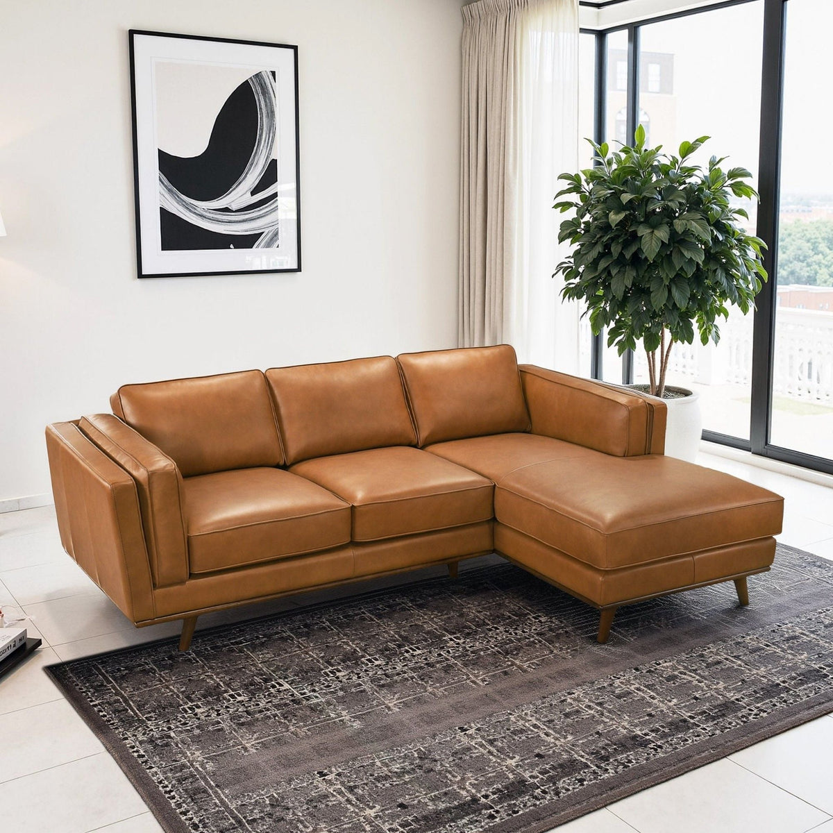 Light brown sectional sofa with chaise corner and padded armrests