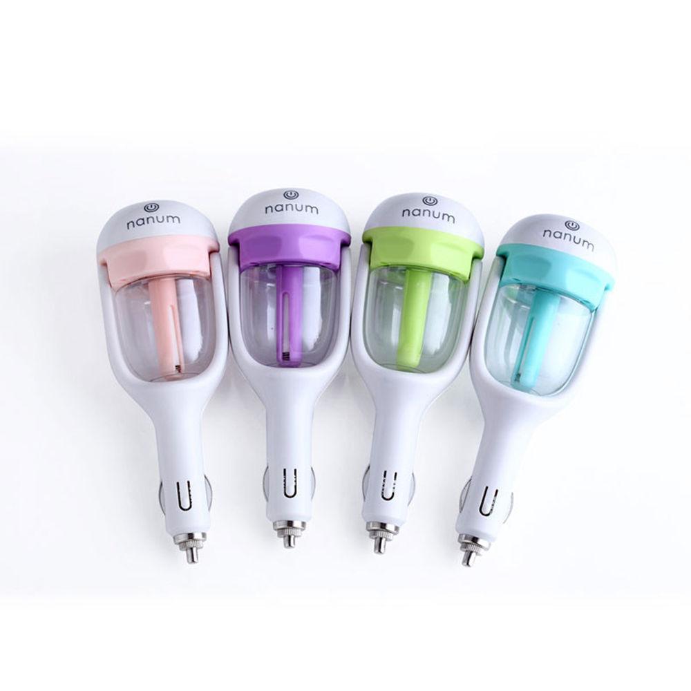Four mini car air humidifier diffusers in pink, purple, green, and blue
