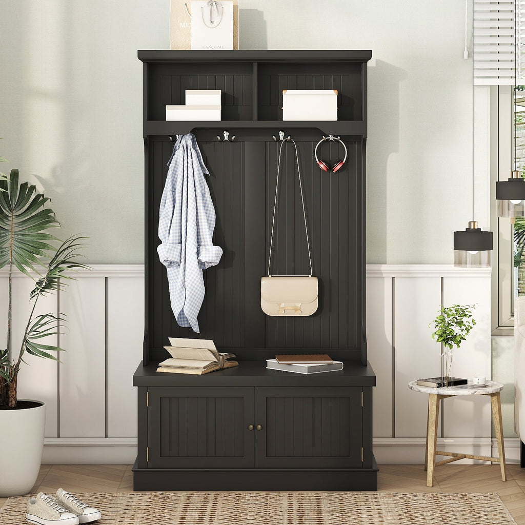 Black hall tree with coat hooks, open shoe bench storage, and top shelf compartments.