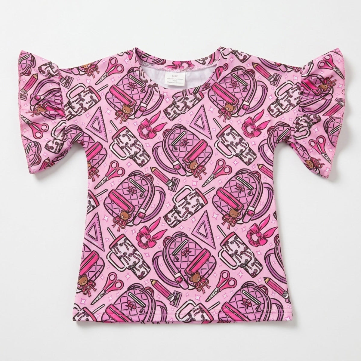 Kids ruffle-sleeve tee in pink with colorful school supply pattern