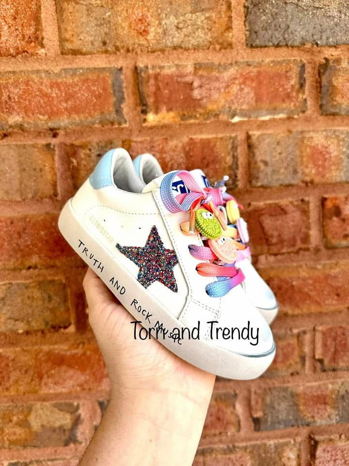 White star sneakers with multicolor laces and playful side graphics