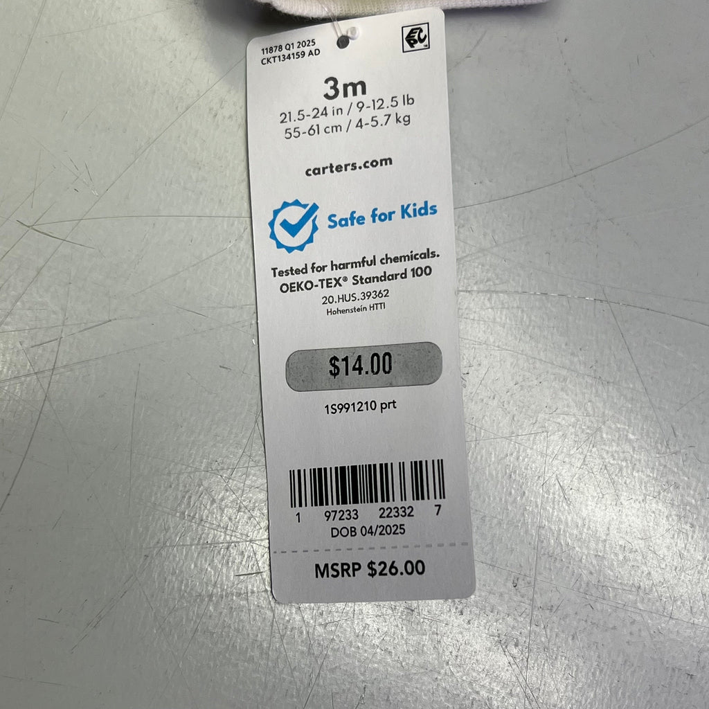 Clothing size tag for baby boy set, shows Safe for Kids testing info.