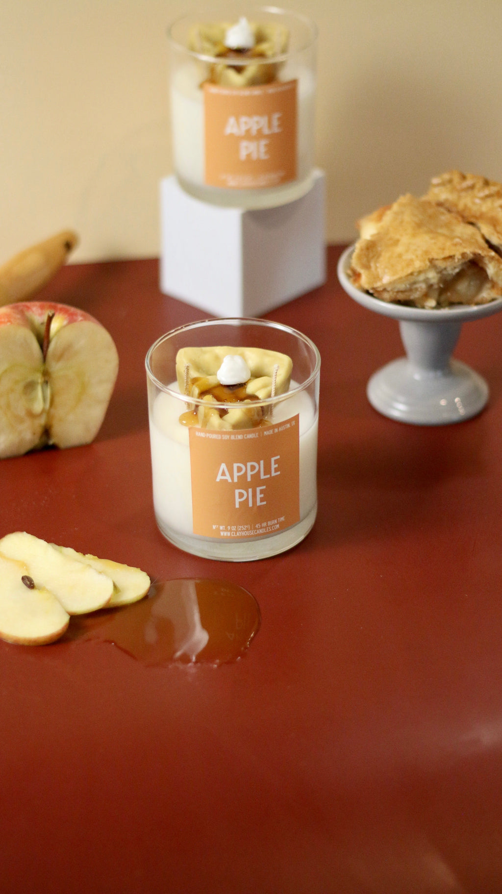 Apple pie container candle set with clear glass jars, “APPLE PIE” labels, and wax tops