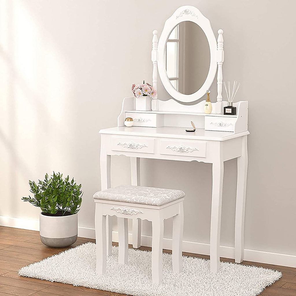 White vanity table set with oval mirror and 4 drawers, plus upholstered cushioned stool