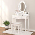 White vanity table set with oval mirror and 4 drawers, plus upholstered cushioned stool