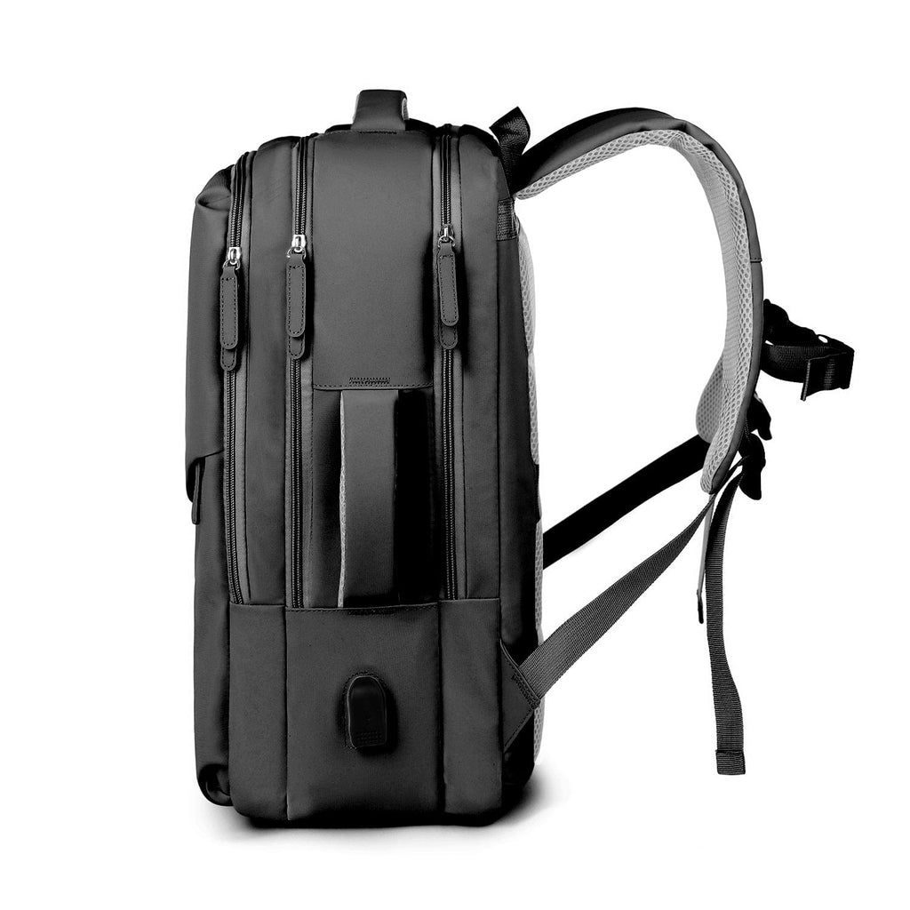 Black multi-pocket travel backpack with front vertical pockets and adjustable straps.