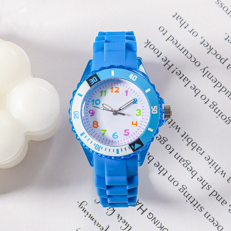 Blue kids analog wristwatch with silicone strap and colorful number dial