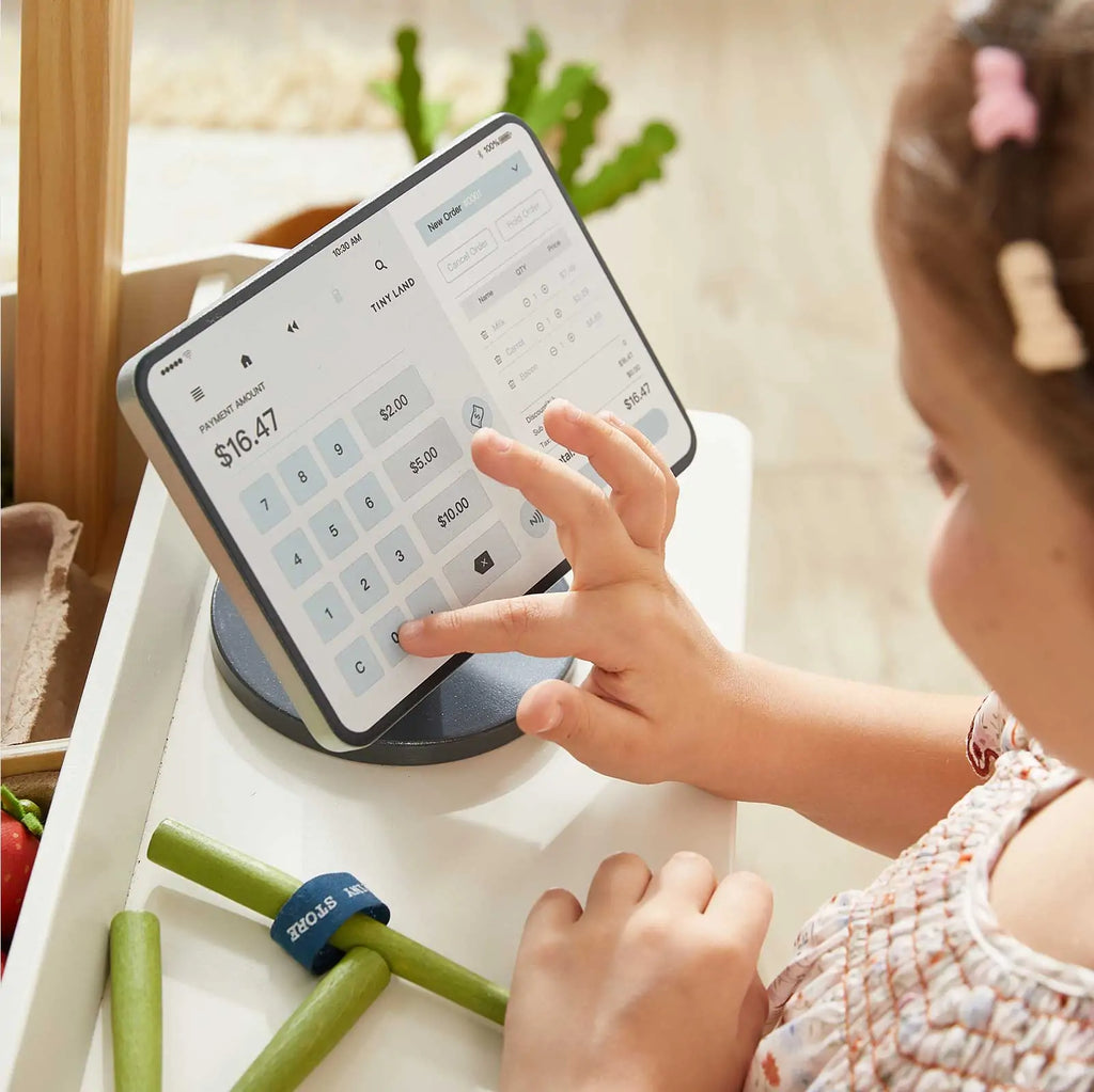 Tiny Land® playset with tablet-style touchscreen showing a pretend checkout keypad