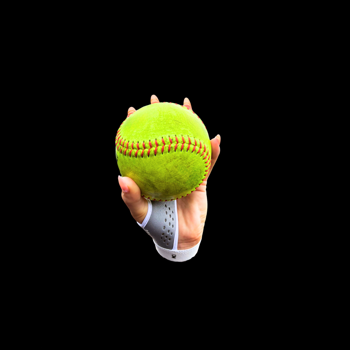 Softball training grip with neon yellow softball held inside gray finger strap