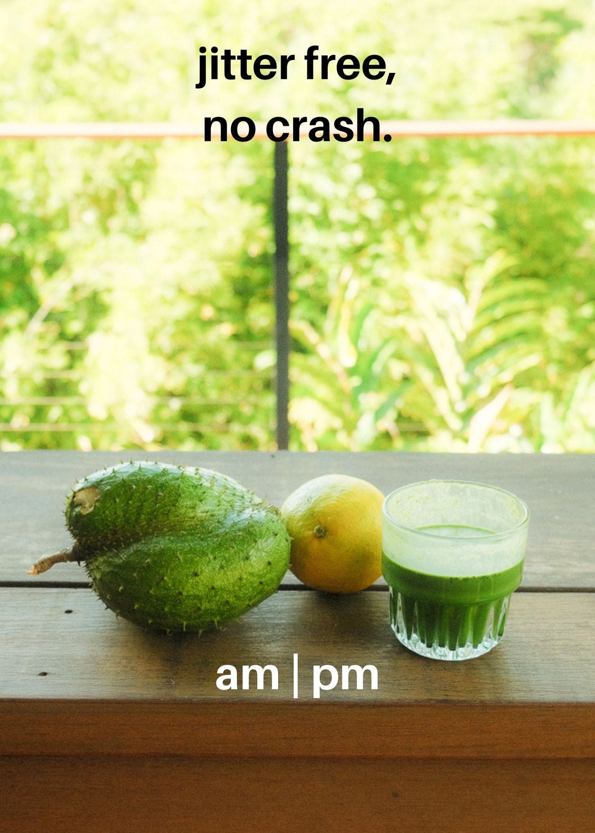 Green matcha drink in a glass beside a spoonful of green powder