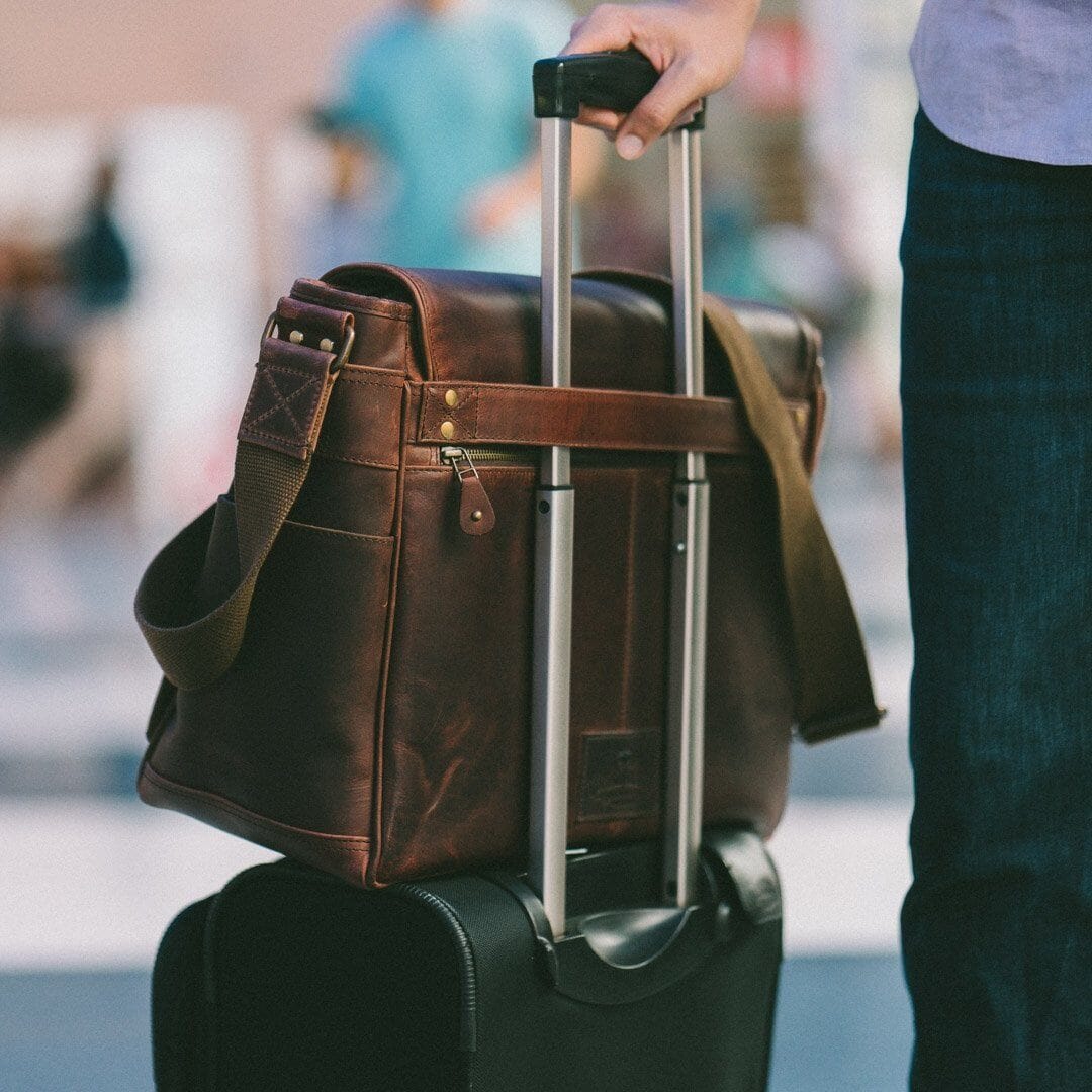 Wilson crossbody bag with trolley pass-through handle for rolling luggage