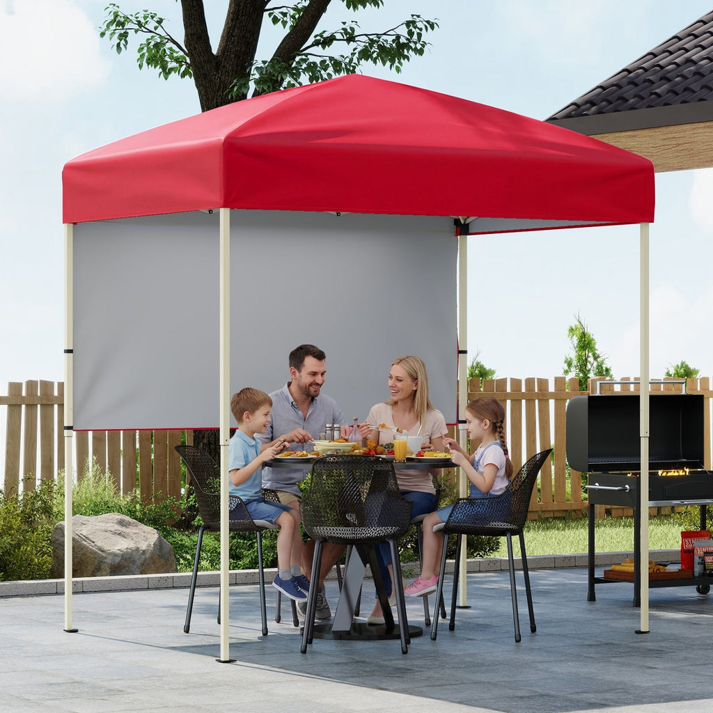 Red pop-up canopy tent with half sidewalls and white frame, open front for patio