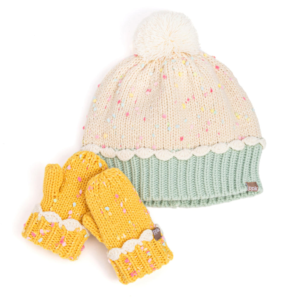 Toddler knit beanie with pom-pom, mint cuff, and matching mittens in cream sprinkles.