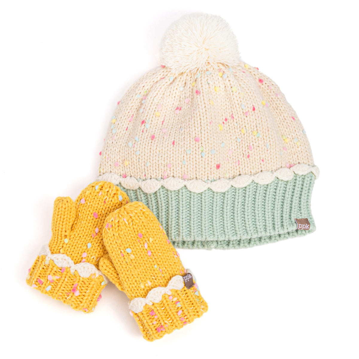 Toddler knit beanie with pom-pom, mint cuff, and matching mittens in cream sprinkles.
