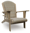 Beige woven Adirondack chair with slatted arms and curved backrest