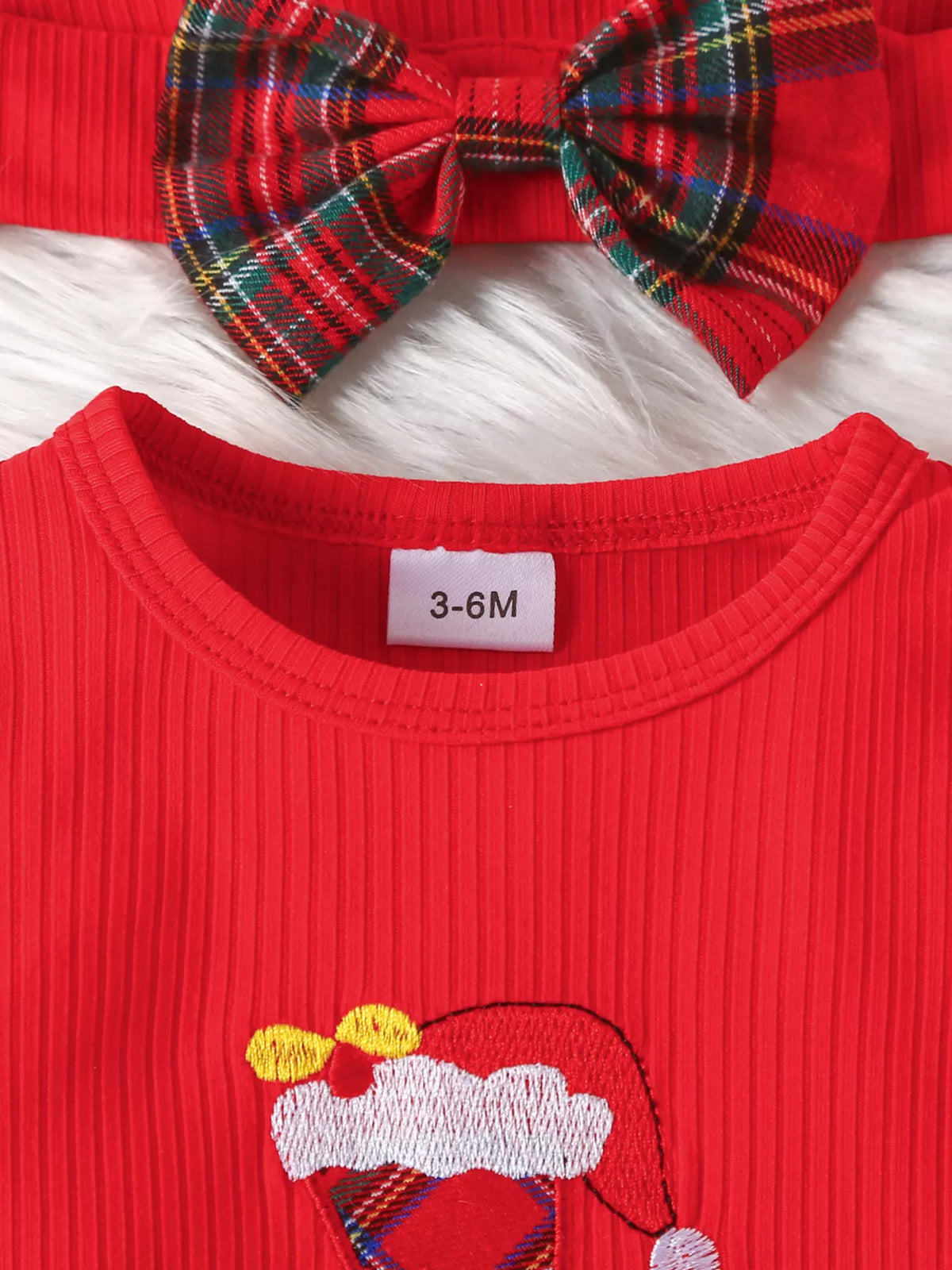 Red bodysuit with bow headband and '3-6M' size label