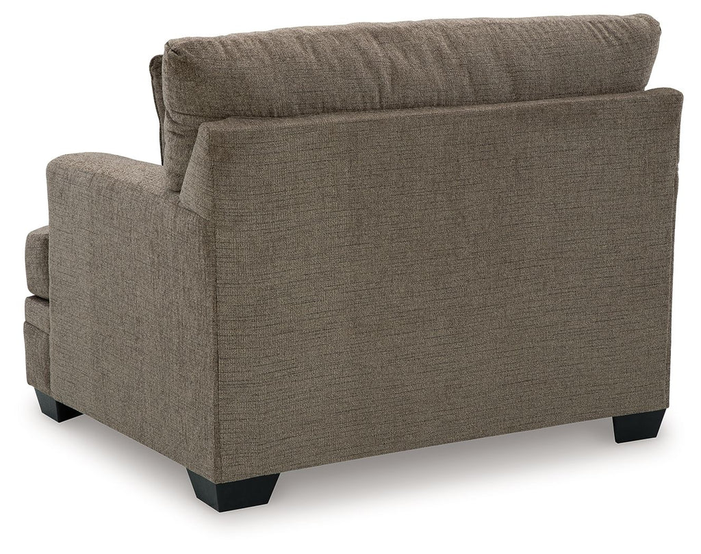 Upholstered living room armchair with track arms and dark legs, gray-brown fabric