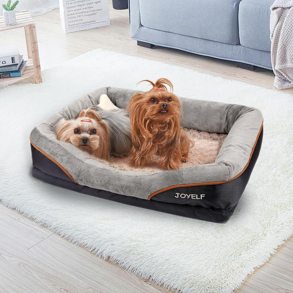 Gray dog bed with orange piping and JOYELF logo, plush cushioned center