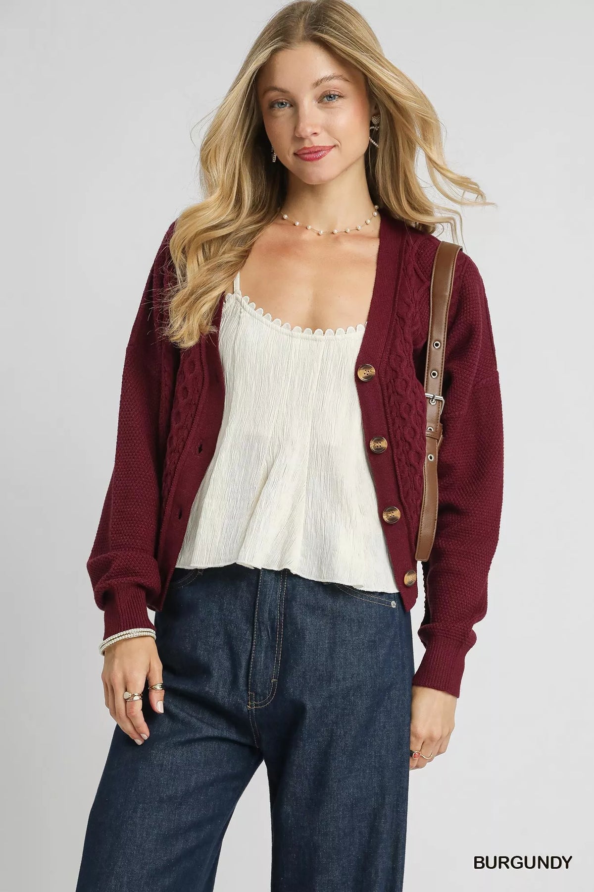 Burgundy chunky cable-knit V-neck button-up cardigan with long sleeves