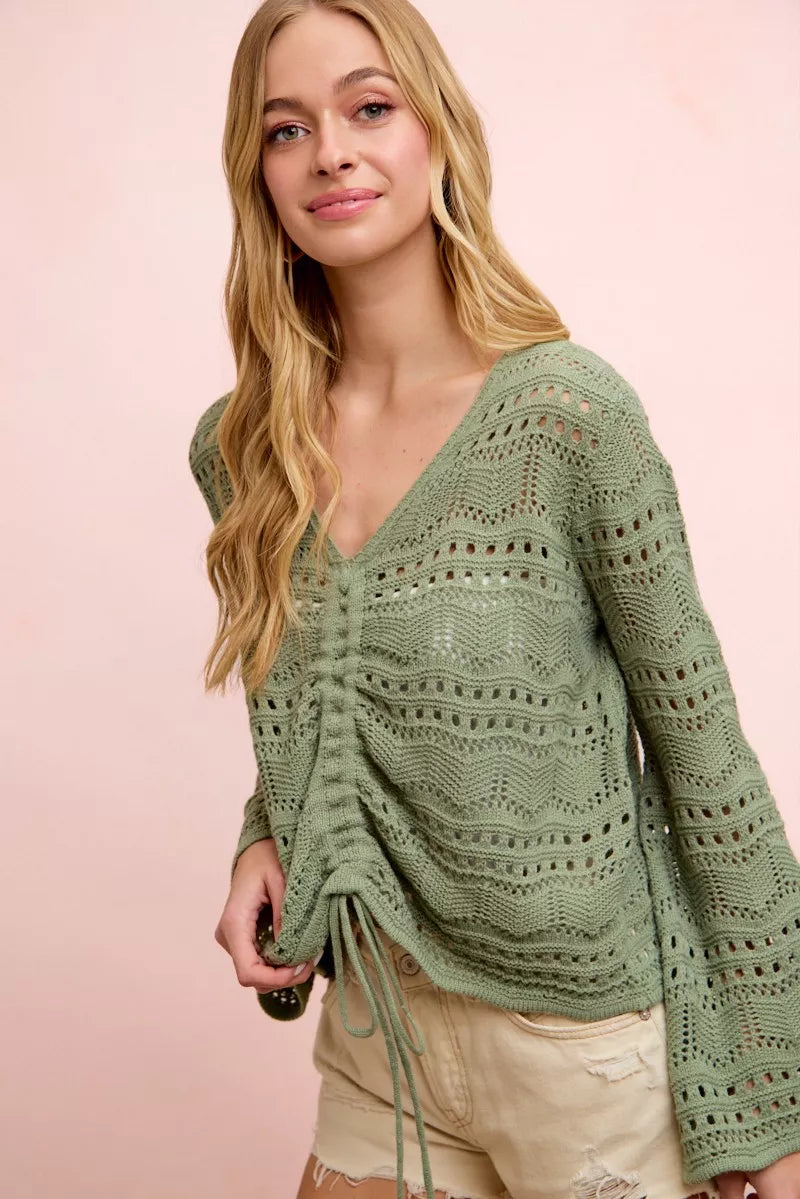 Sage green pointelle knit V-neck ruched front top, long sleeves with openwork pattern