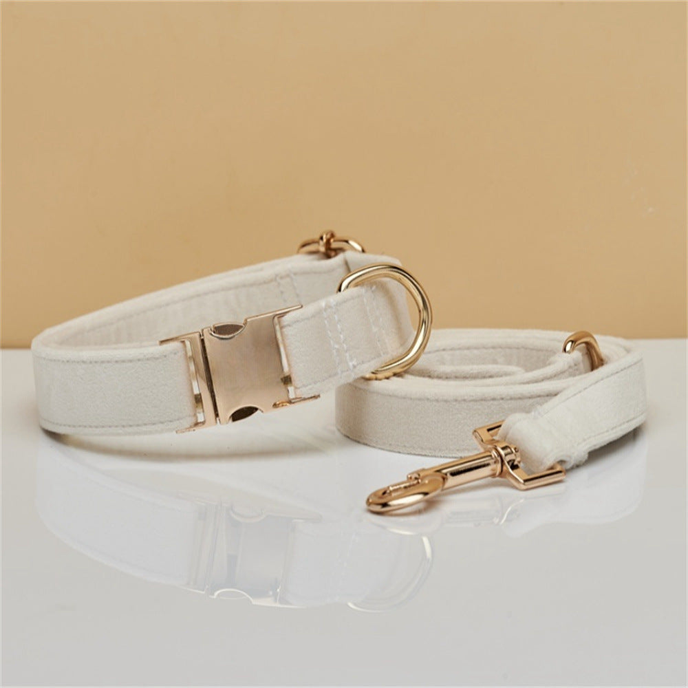 White velvet dog collar with matching leash, gold-tone buckle and D-ring