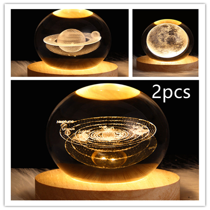 LED galaxy crystal ball lamp with glowing solar-system ring design; wooden base