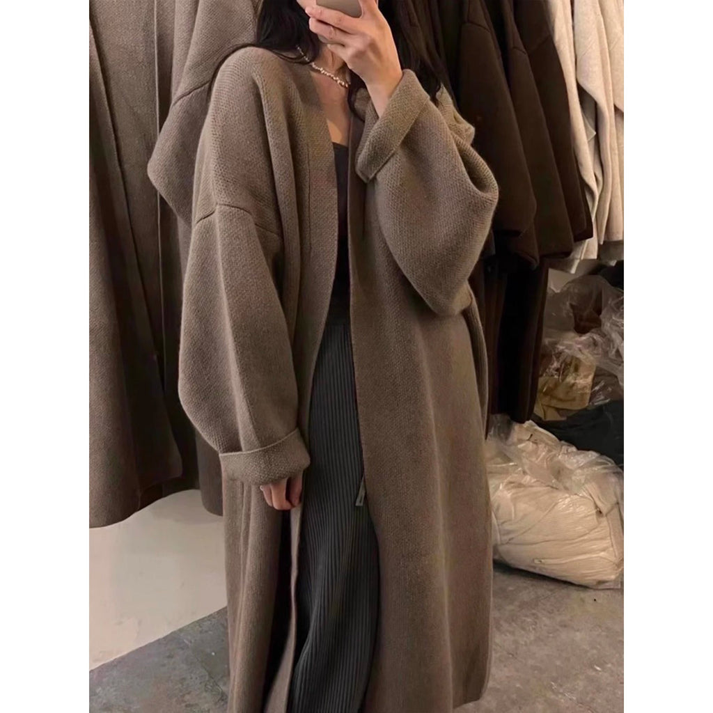 Beige tan knitted long cardigan sweater with loose sleeves and open front