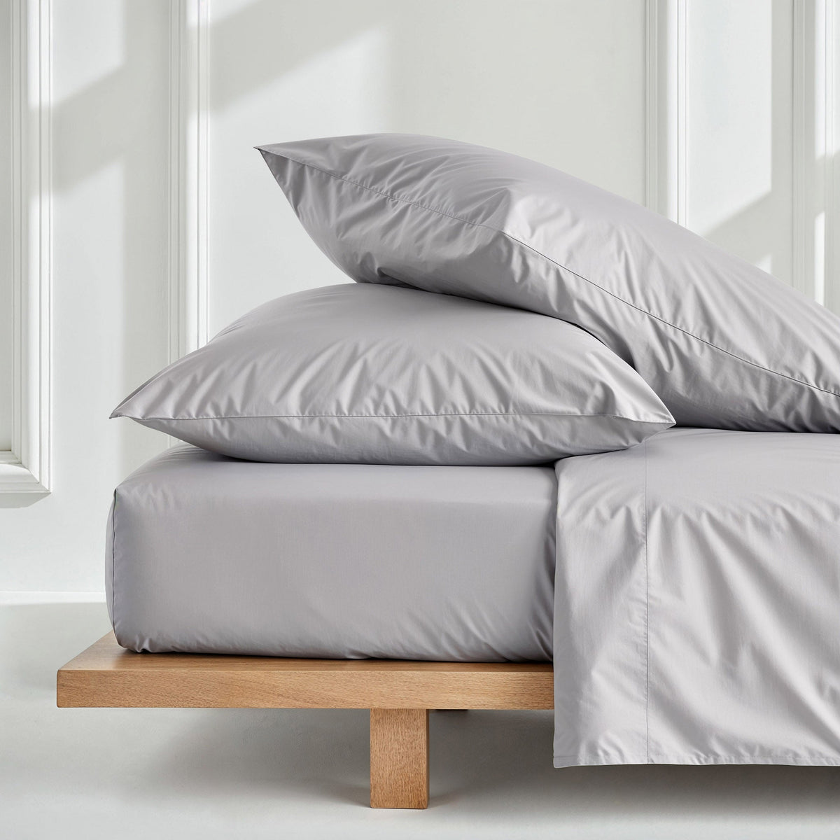 Gray sateen sheet set with two pillowcases and fitted sheet, smooth finish