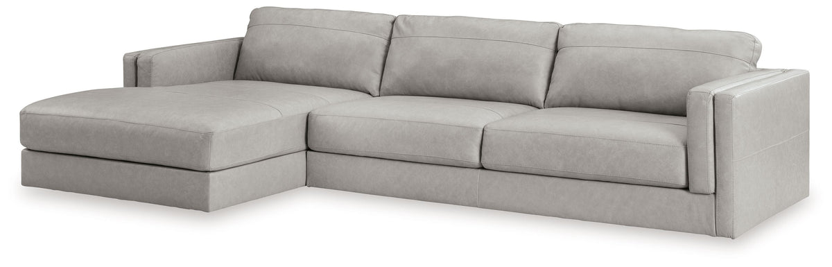 Light gray upholstered sectional sofa with corner chaise and wide armrests