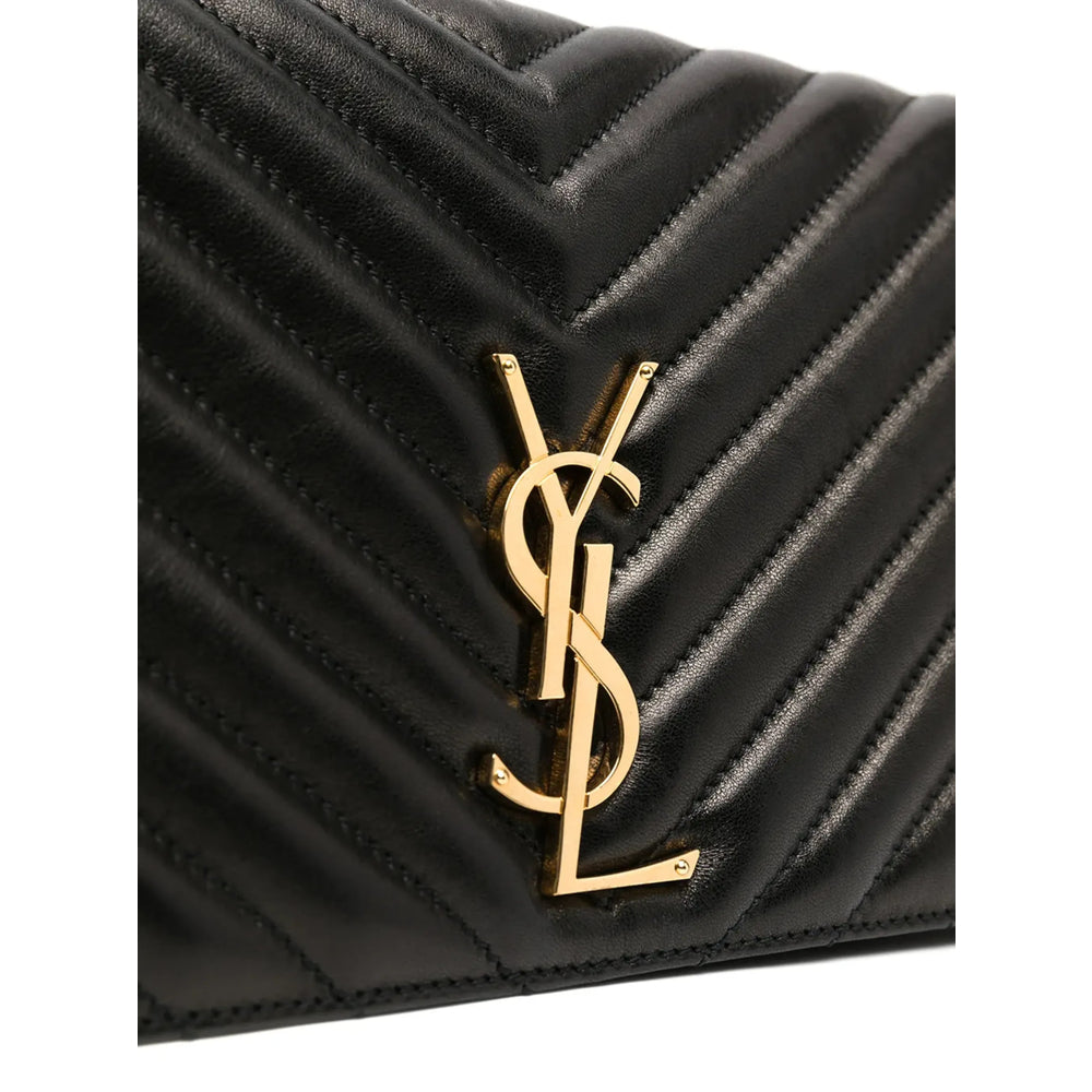 Quilted black leather bag with large gold YSL emblem on front flap