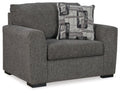 Pewter upholstered chair and a half with squared arms and patterned back pillow