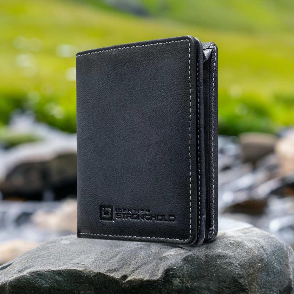 Minimalist RFID wallet, black leather front view with stitched seam and logo