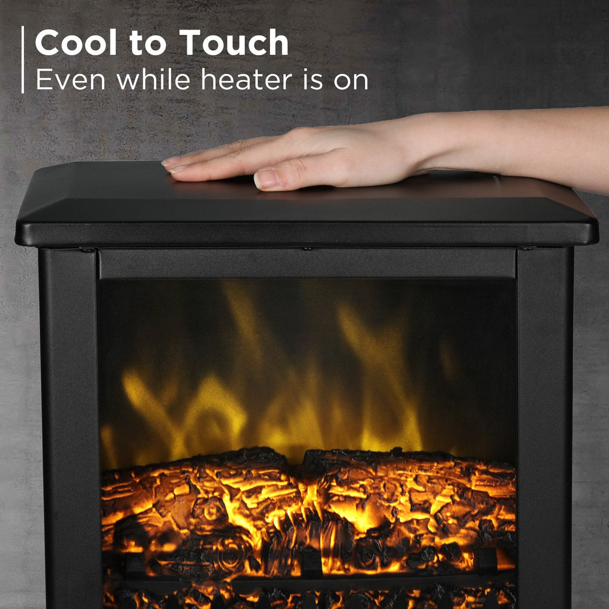 Black electric fireplace stove heater with hand resting on the cool top cover