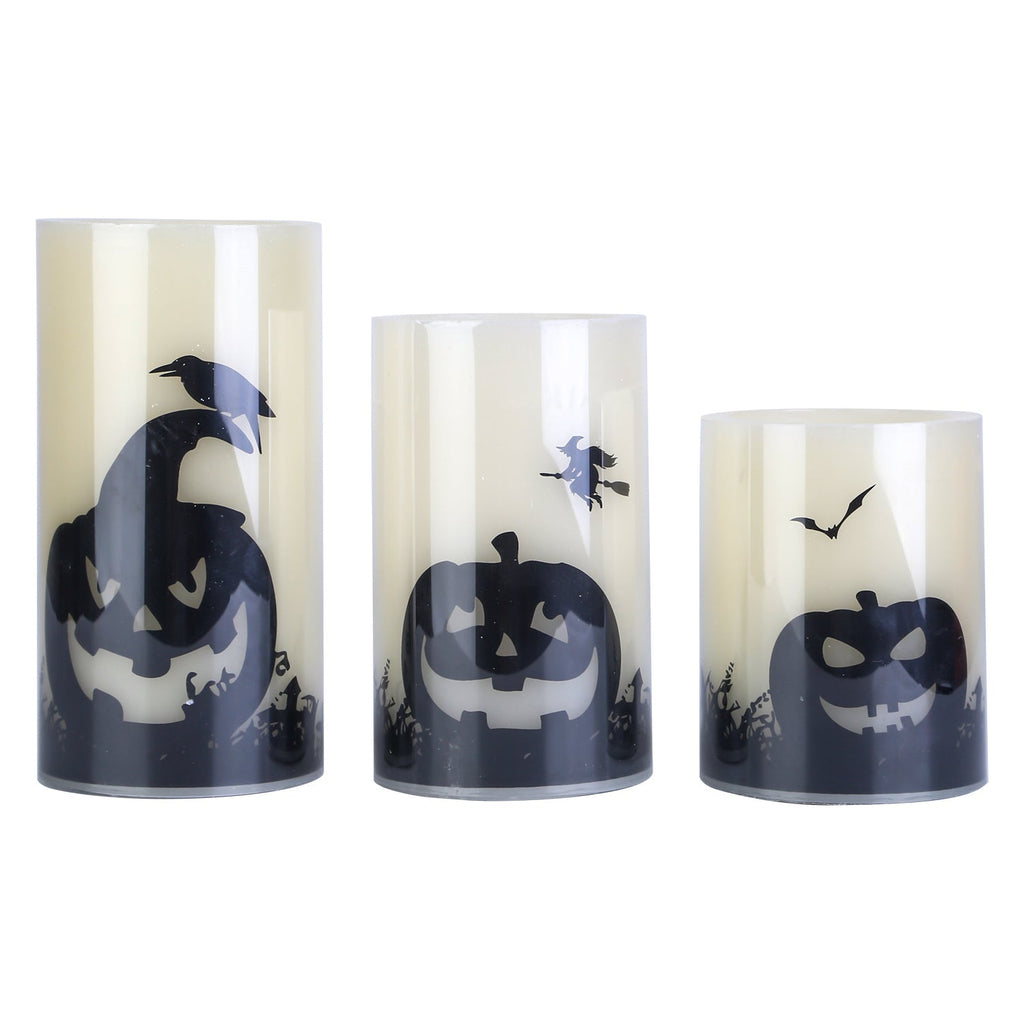 3-pack LED flameless candles with jack-o-lantern and bat silhouettes, warm orange glow