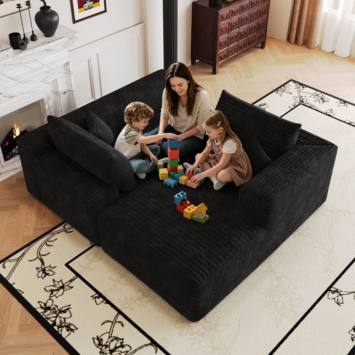 Dark plush corduroy sectional sofa with chaise seating and supportive back pillows