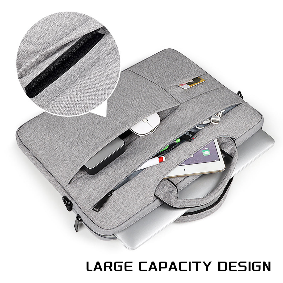 Gray laptop bag open, showing padded laptop slots and organizer pockets, zippered interior