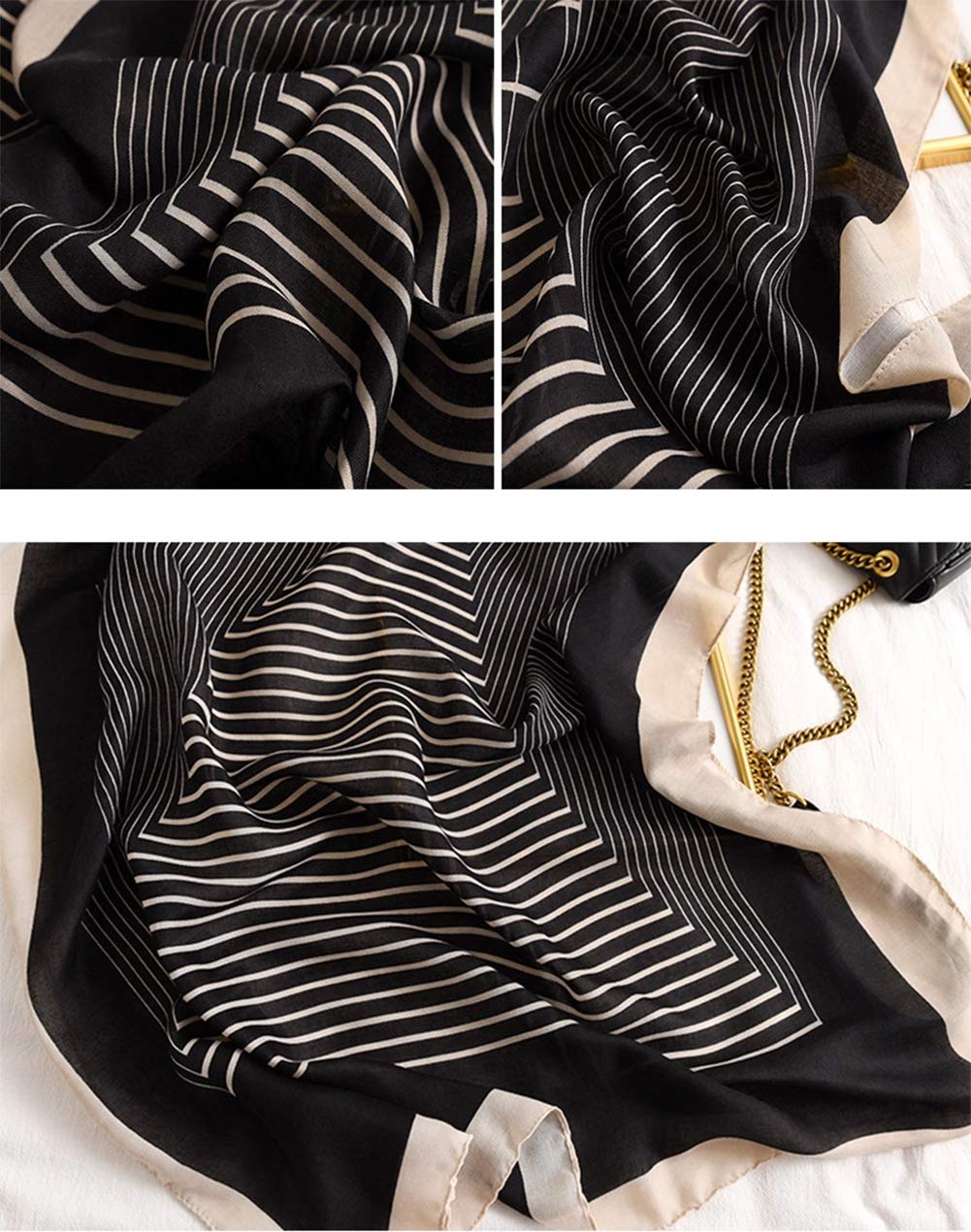 Black striped scarf close-up with light beige wavy line pattern and folded edge