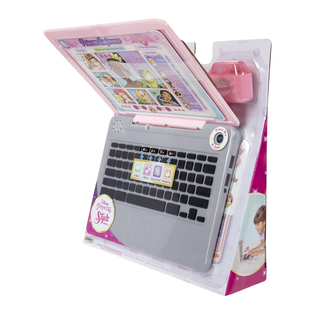 Kids laptop open on its side with pink-themed keyboard area and included play accessories