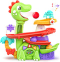 Air-powered dinosaur ball popper toy with green dino face and red ball launcher