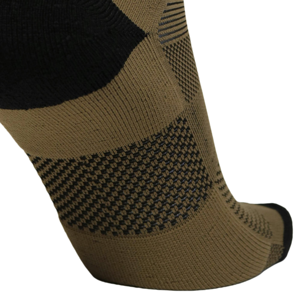 Coyote Brown jungle sock close-up with black knit diamond-style panel and dark toe