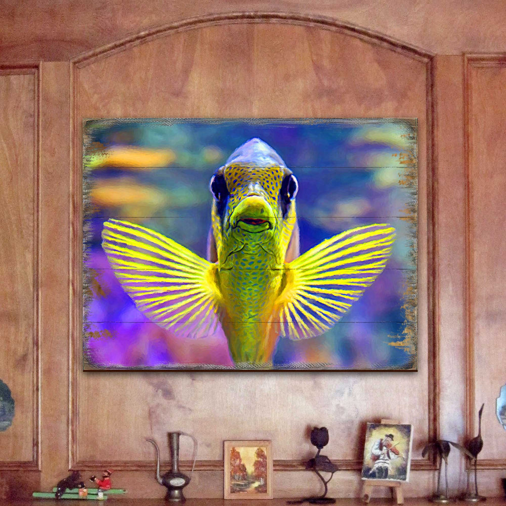 Framed tropical fish wall art with winged fish motif, vibrant sea-life print on canvas.