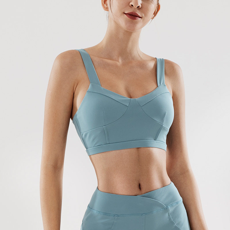Dusty blue sports bra with matching high-waist underwear, front view.